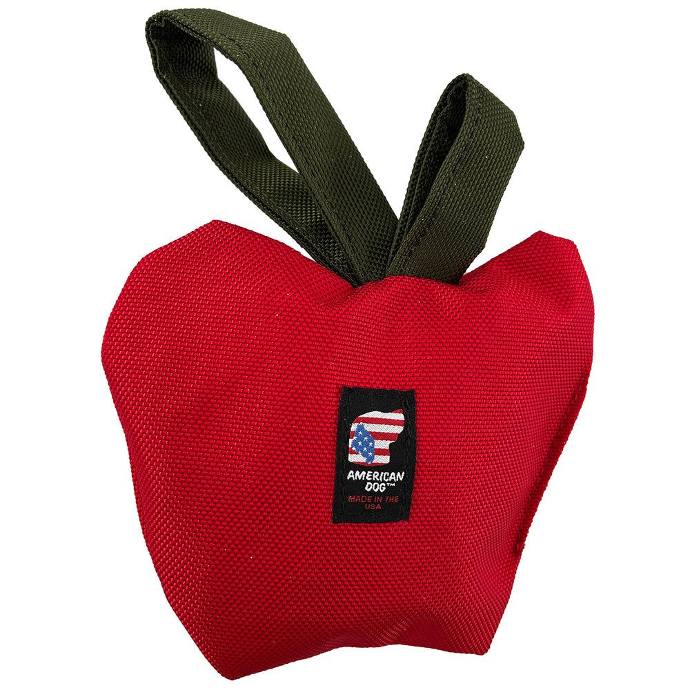 Apple Tug, a red ballistic nylon apple with green loop handles