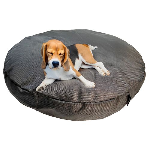 Armor™ Round Bed in Charcoal, with a dog on it