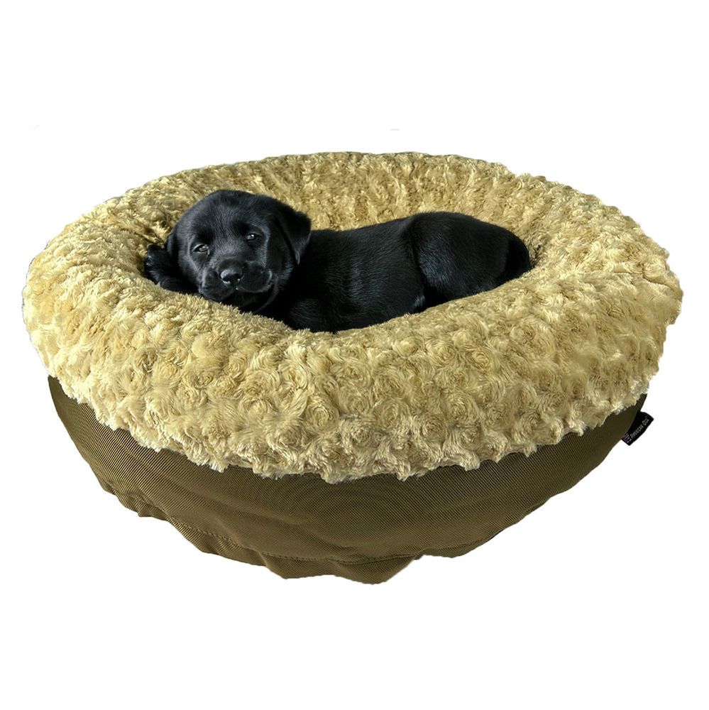 Furvana™ Round Bolster Bed in Camel, with a dog on it