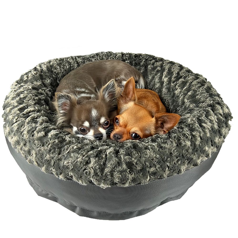 Furvana™ Round Bolster Bed in Charcoal, with a dog on it