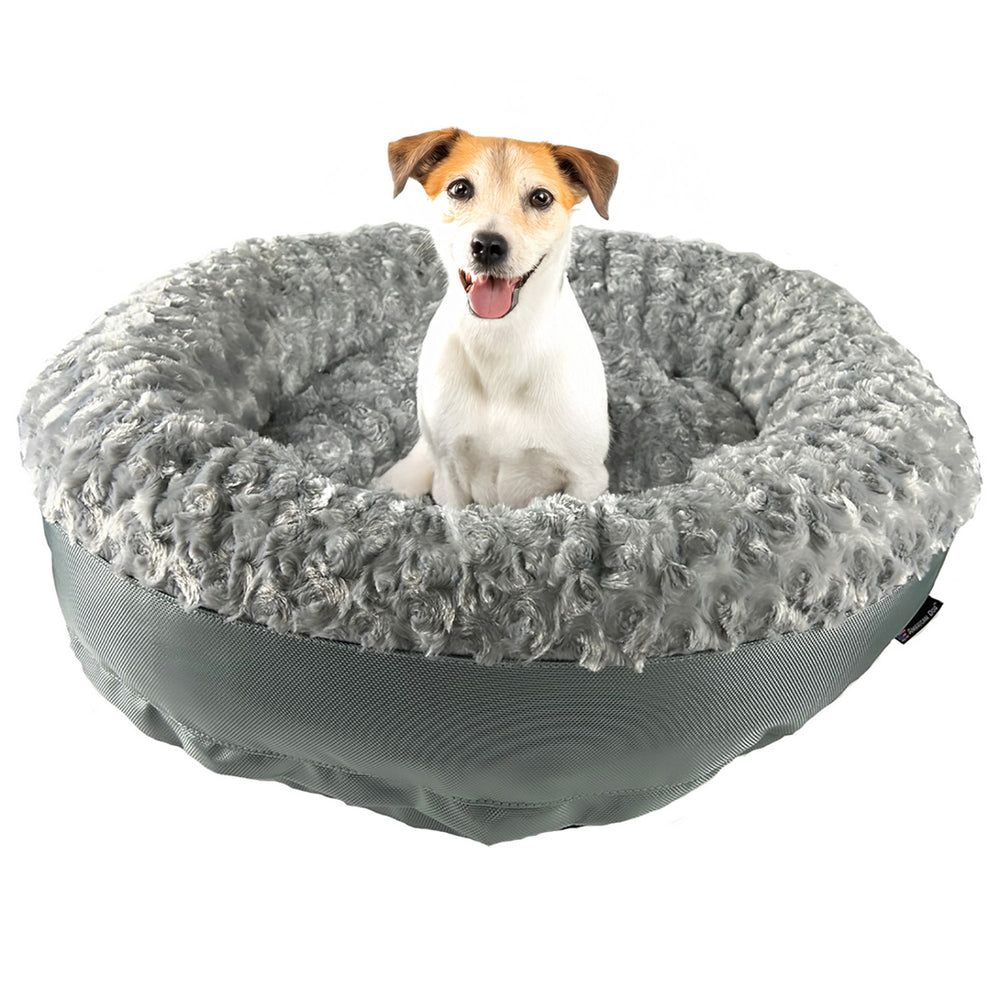 Furvana™ Round Bolster Bed in Silver, with a dog on it